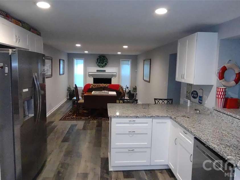 769 Dennis Road, Troy, NC 27371.  MLS# CAR4374021, YatesRealty ID 22151. Entry into Kitchen