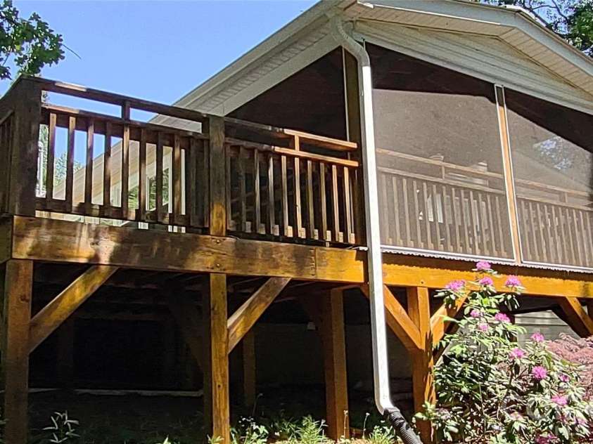 769 Dennis Road, Troy, NC 27371.  MLS# CAR4374021, YatesRealty ID 22151. Screen porch on water side
