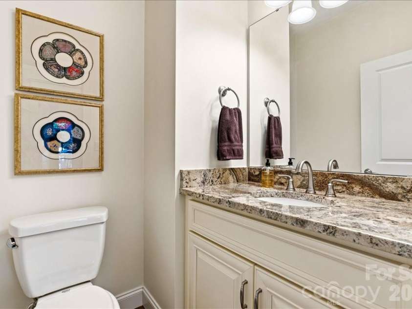 15 Quail Hollow Drive, Arden, NC 28704.  MLS# CAR4372474, YatesRealty ID 22155. 1st floor half bath