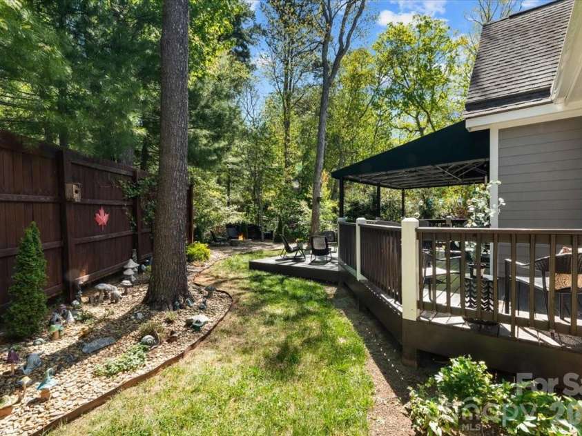 15 Quail Hollow Drive, Arden, NC 28704.  MLS# CAR4372474, YatesRealty ID 22155. Side view