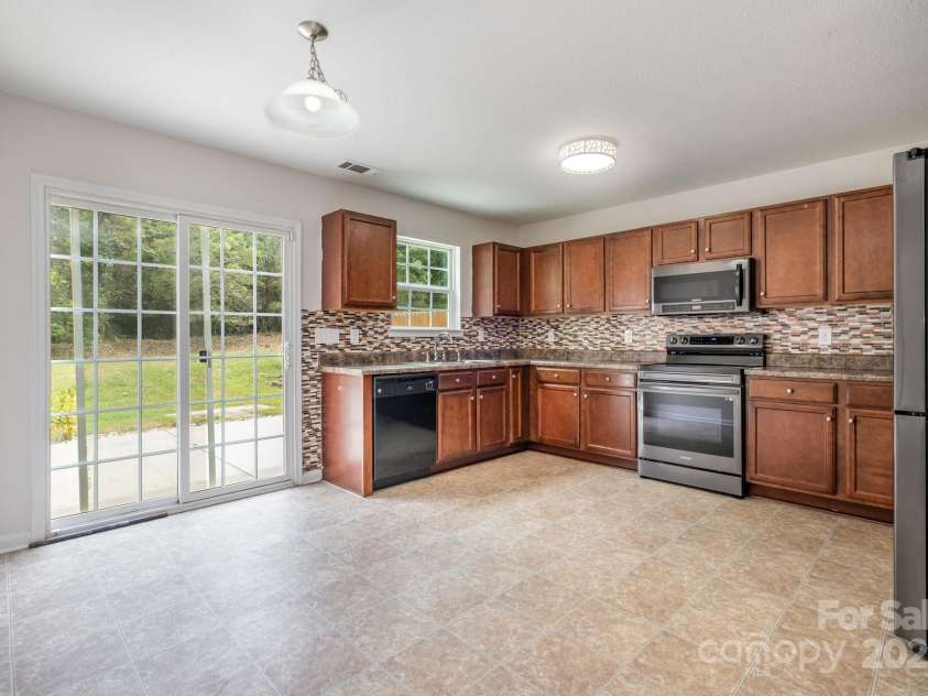 9718 Eagle Feathers Drive, Charlotte, NC 28214.  MLS# CAR4287623, YatesRealty ID 22156. 