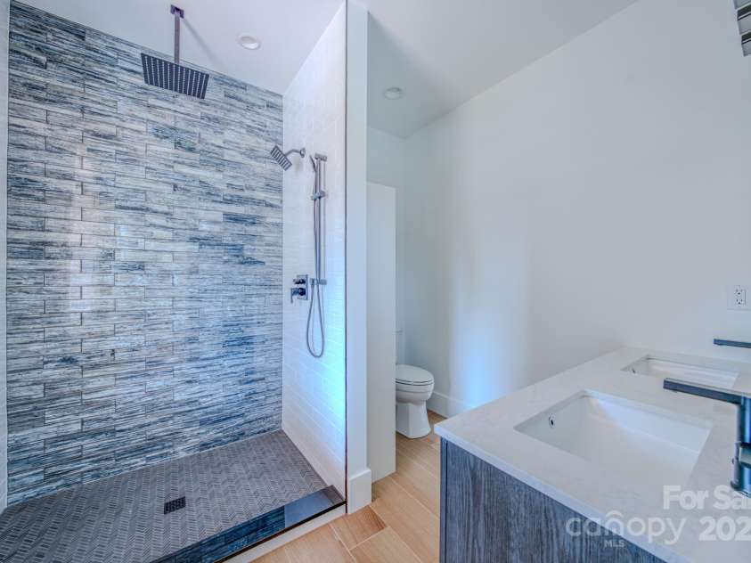 133 Grove Street, Asheville, NC 28801.  MLS# CAR4286313, YatesRealty ID 2216. First Floor Main Suite Bathroom