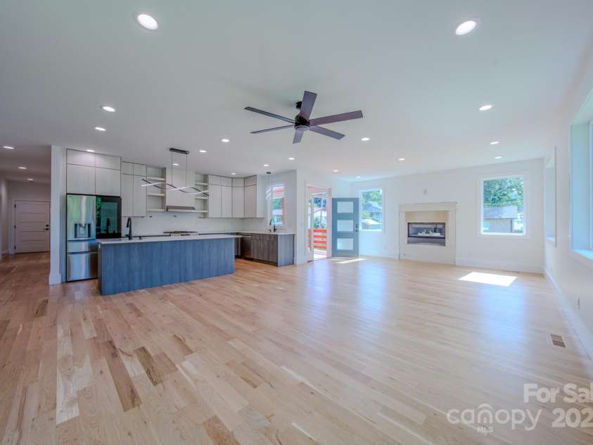 133 Grove Street, Asheville, NC 28801.  MLS# CAR4286313, YatesRealty ID 2216. Kitchen View/Living room and fireplace view