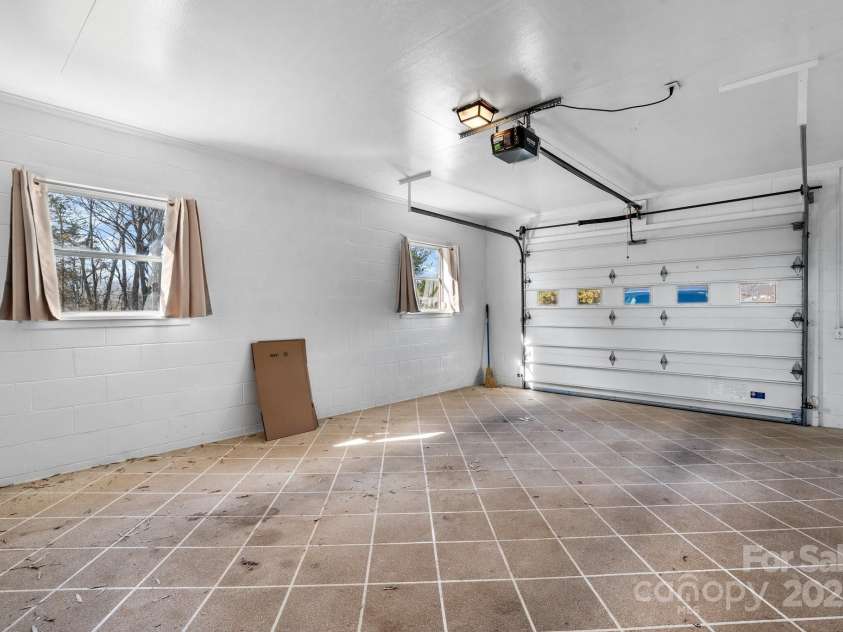 63 Wagner Road, Taylorsville, NC 28681.  MLS# CAR4220675, YatesRealty ID 2216. Main level garage