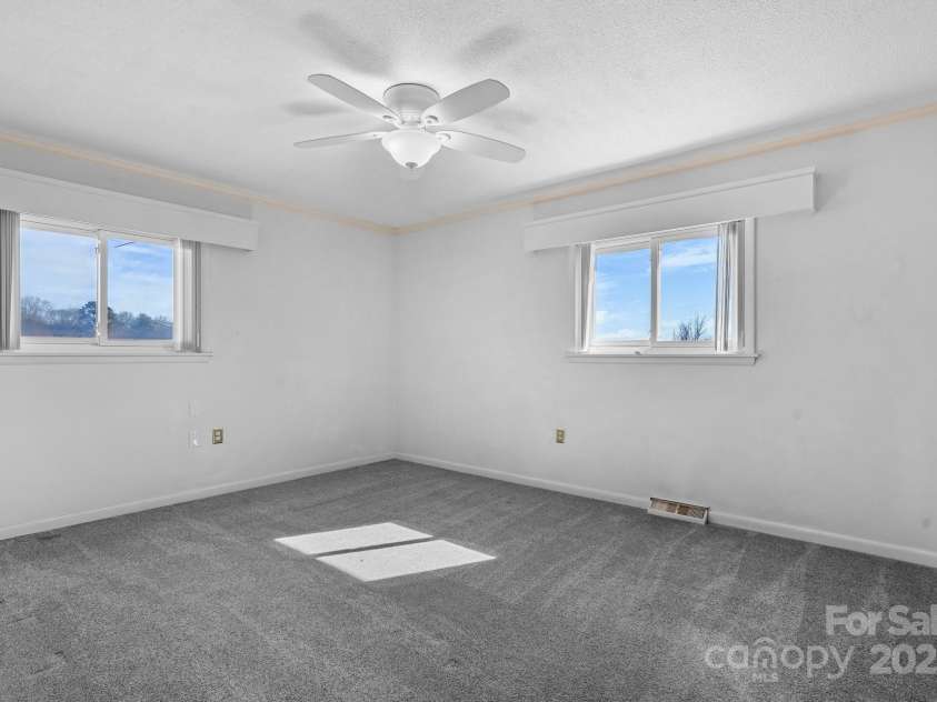 63 Wagner Road, Taylorsville, NC 28681.  MLS# CAR4220675, YatesRealty ID 2216. Primary bedroom