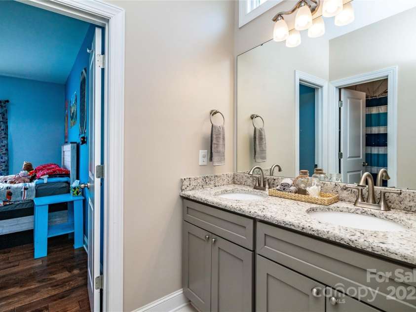 1858 Brevard Place Road, Iron Station, NC 28080.  MLS# CAR4265336, YatesRealty ID 22165. Jack and Jill Bath