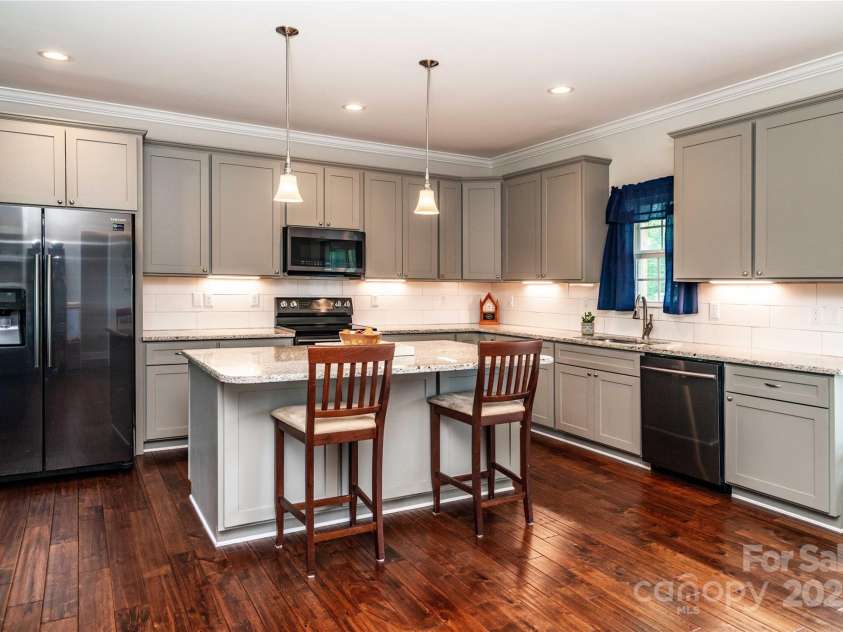 1858 Brevard Place Road, Iron Station, NC 28080.  MLS# CAR4265336, YatesRealty ID 22165. Kitchen with Large Island