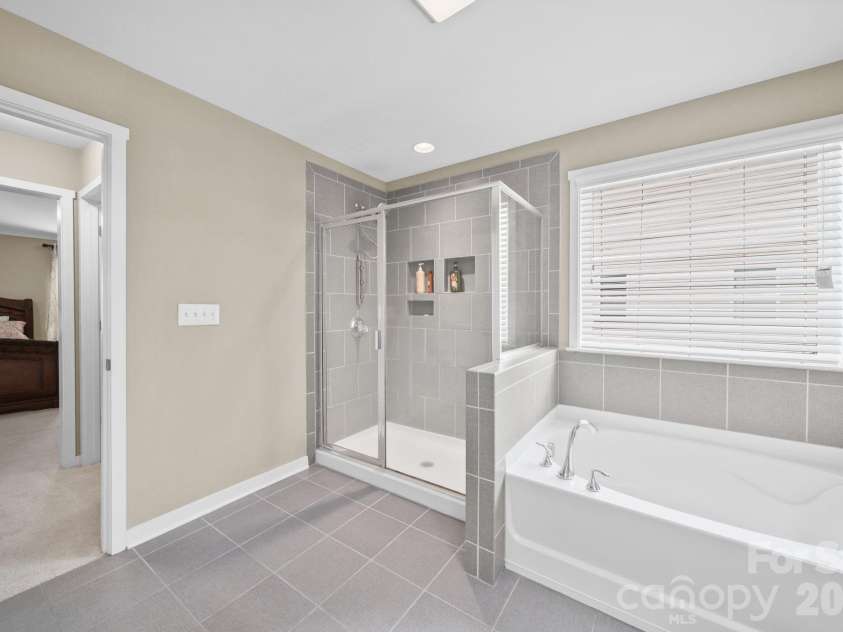 4019 Orchid Way, Tega Cay, SC 29708.  MLS# CAR4369824, YatesRealty ID 22166. Primary Bathroom
