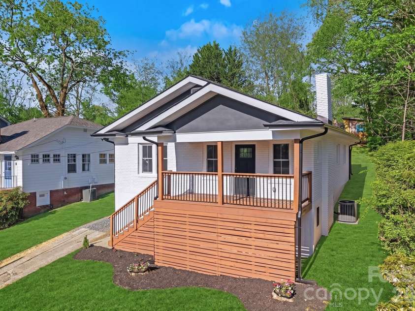 154 Laurel Loop, Asheville, NC 28806.  MLS# CAR4401401, YatesRealty ID 22169. The grass has been digitally enhanced