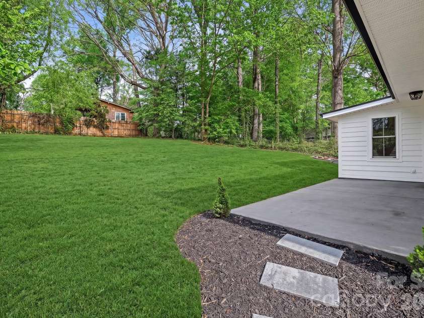 154 Laurel Loop, Asheville, NC 28806.  MLS# CAR4401401, YatesRealty ID 22169. The grass has been digitally enhanced