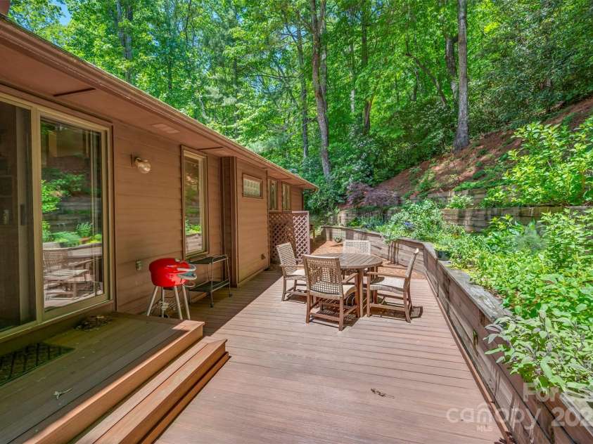 172 Overlook Drive, Flat Rock, NC 28731.  MLS# CAR4224391, YatesRealty ID 2217. Composite deck, accessed directly from den