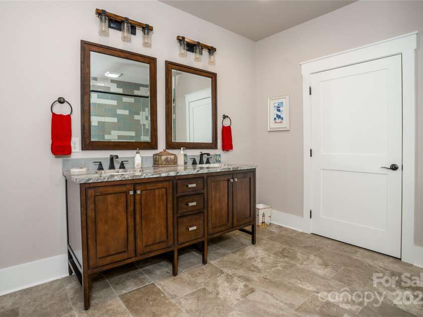1003 Glory Drive, Morganton, NC 28655.  MLS# CAR4264469, YatesRealty ID 22171. Downstairs Bathroom