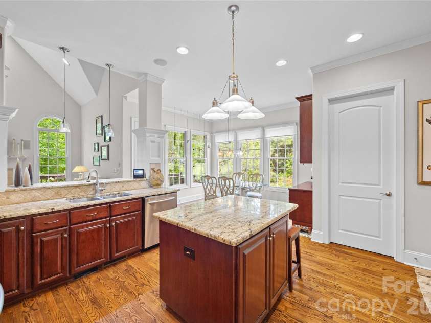 5826 Natoma Road, Clover, SC 29710.  MLS# CAR4372920, YatesRealty ID 22174. Kitchen, sunny breakfast area and door to laundry room