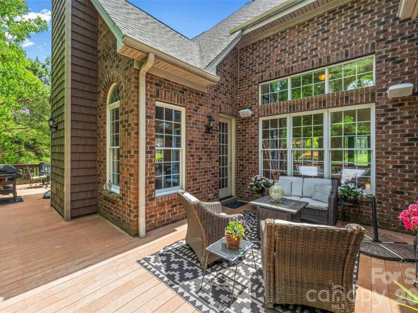 5826 Natoma Road, Clover, SC 29710.  MLS# CAR4372920, YatesRealty ID 22174. Rear deck with trex decking