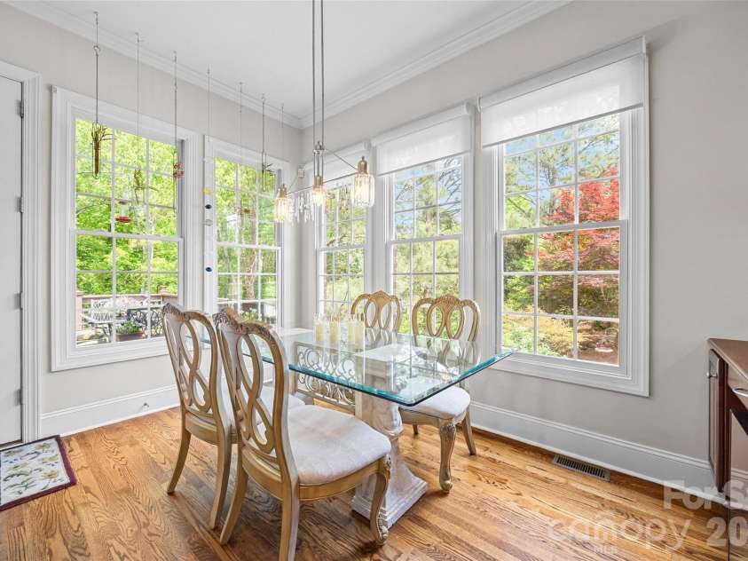 5826 Natoma Road, Clover, SC 29710.  MLS# CAR4372920, YatesRealty ID 22174. Sunny breakfast area with exit to rear deck