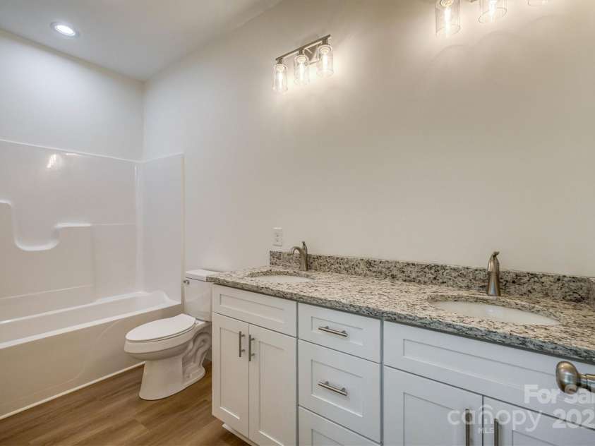 216 Stephens Drive, Morganton, NC 28655.  MLS# CAR4271572, YatesRealty ID 22183. Primary Ensuite Bathroom