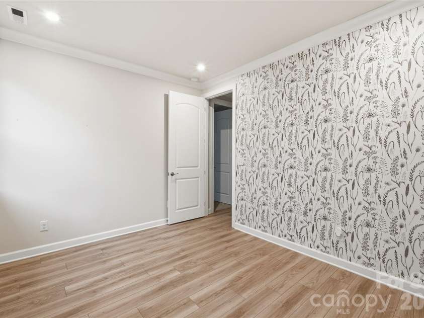9534 Liberty Hill Drive, Mint Hill, NC 28227.  MLS# CAR4378048, YatesRealty ID 22183. BR with wallpaper accent wall