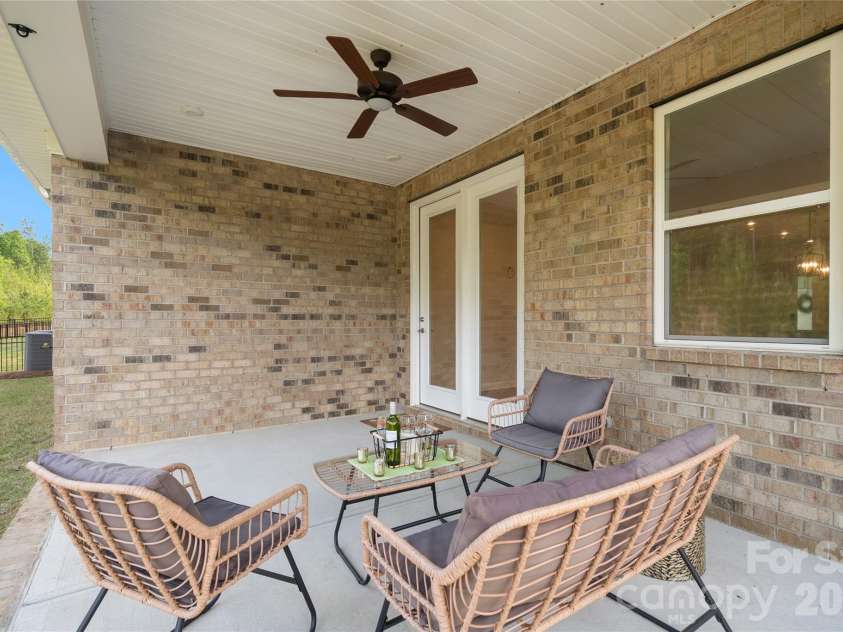 9534 Liberty Hill Drive, Mint Hill, NC 28227.  MLS# CAR4378048, YatesRealty ID 22183. Covered Back Porch