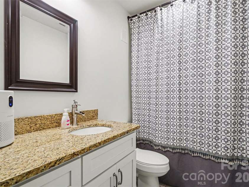 7250 Empire Drive, Mount Pleasant, NC 28124.  MLS# CAR4379274, YatesRealty ID 22188. Basement full bathroom 