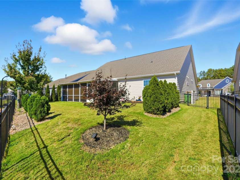 1224 Dali Boulevard, Mount Holly, NC 28120.  MLS# CAR4274726, YatesRealty ID 22189. Beautiful rear yard with plenty of trees