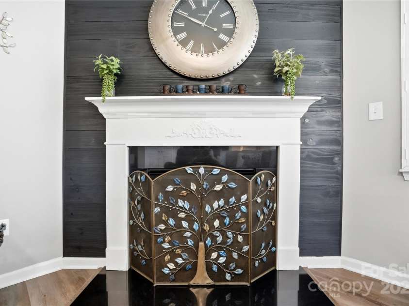 1224 Dali Boulevard, Mount Holly, NC 28120.  MLS# CAR4274726, YatesRealty ID 22189. Gas log fireplace with custom shiplap accent wall.