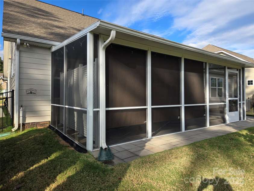 1224 Dali Boulevard, Mount Holly, NC 28120.  MLS# CAR4274726, YatesRealty ID 22189. Screened Porch with Privacy Blinds