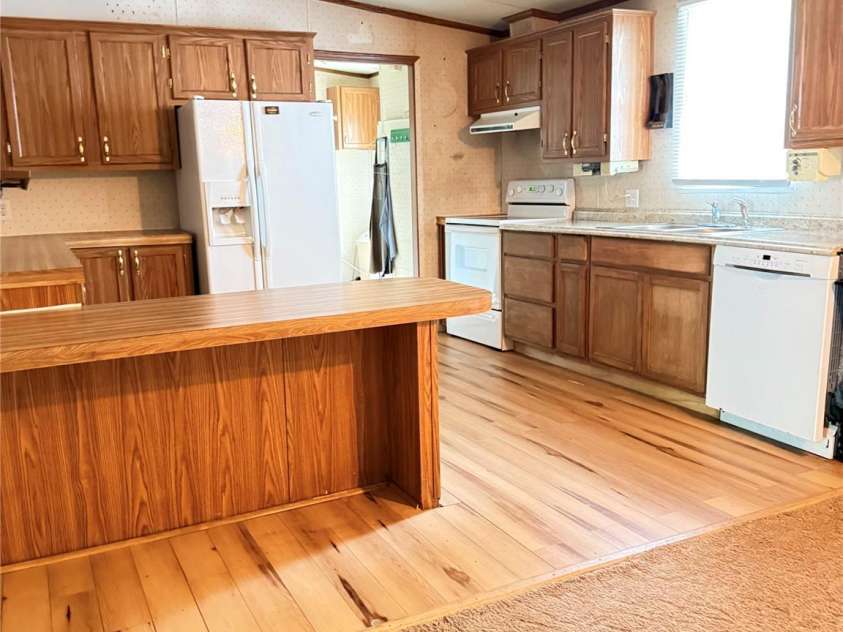 13080 Philadelphia Church Road, Oakboro, NC 28129.  MLS# CAR4222259, YatesRealty ID 2219. Dishwasher, refrigerator and stove