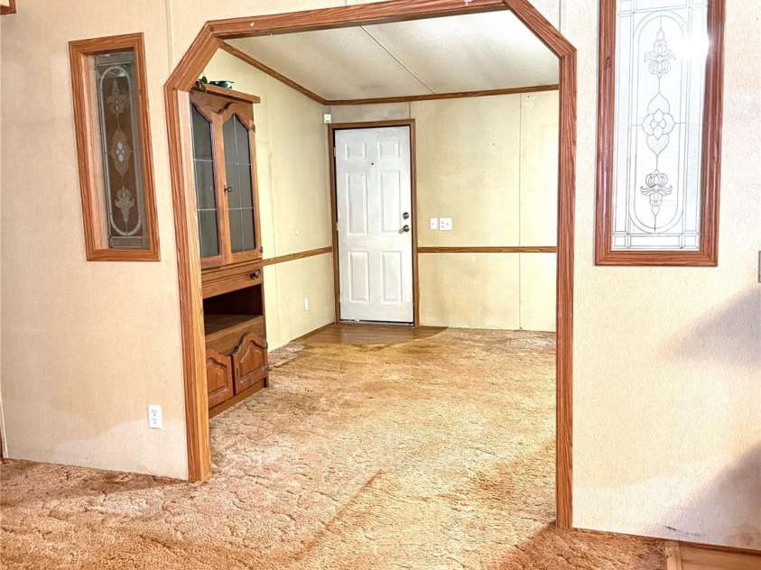 13080 Philadelphia Church Road, Oakboro, NC 28129.  MLS# CAR4222259, YatesRealty ID 2219. From breakfast area looking into living room