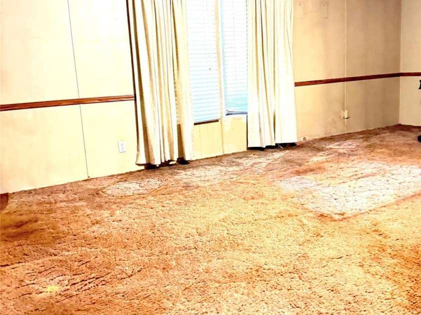 13080 Philadelphia Church Road, Oakboro, NC 28129.  MLS# CAR4222259, YatesRealty ID 2219. Living area with large window