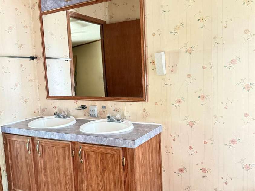 13080 Philadelphia Church Road, Oakboro, NC 28129.  MLS# CAR4222259, YatesRealty ID 2219. Primary bath