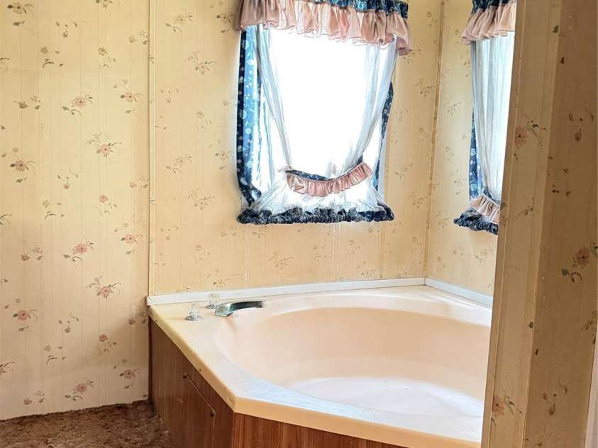 13080 Philadelphia Church Road, Oakboro, NC 28129.  MLS# CAR4222259, YatesRealty ID 2219. Primary bath with tub