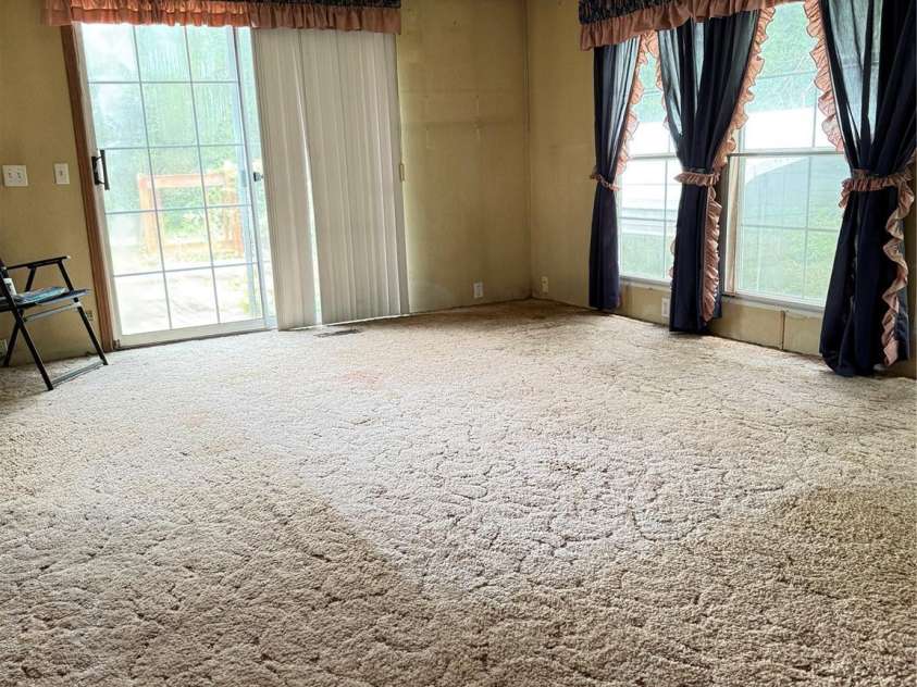 13080 Philadelphia Church Road, Oakboro, NC 28129.  MLS# CAR4222259, YatesRealty ID 2219. Sliding glass doors at end of sunroom