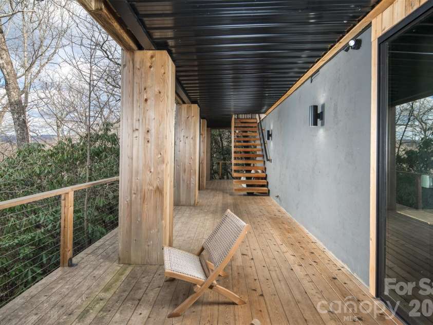 206 Tsisdvna Lane, Brevard, NC 28712.  MLS# CAR4334880, YatesRealty ID 2219. Floating Exterior Stair Case