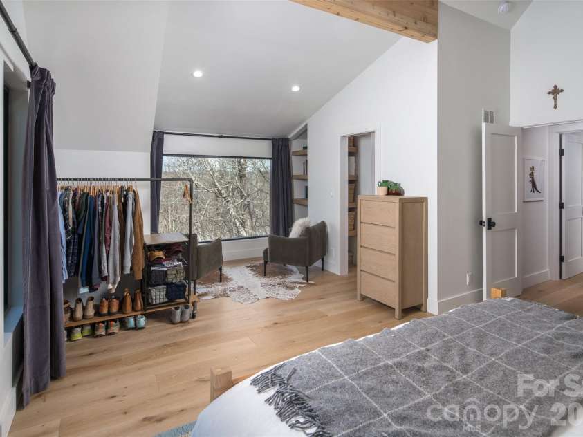 206 Tsisdvna Lane, Brevard, NC 28712.  MLS# CAR4334880, YatesRealty ID 2219. Seating Area + En-suite bath