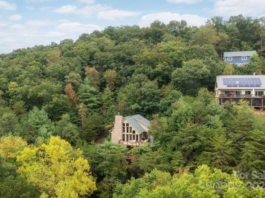 130 Black Oak Drive, Asheville, NC 28804.  MLS# CAR4186383, YatesRealty ID 22192. Nestled in the Forest