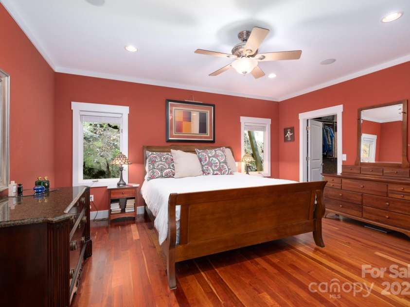 130 Black Oak Drive, Asheville, NC 28804.  MLS# CAR4186383, YatesRealty ID 22192. Spacious Primary Bedroom with Brazilian Cherry Flooring