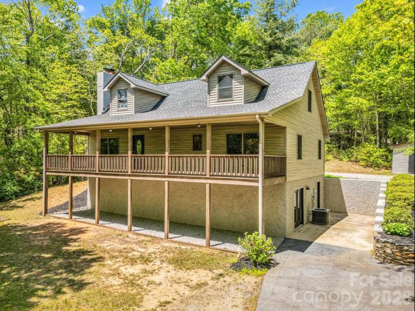 2304 Mountain Page Road, Saluda, NC 28773.  MLS# CAR4366725, YatesRealty ID 22195. Quintessential Covered Deck
