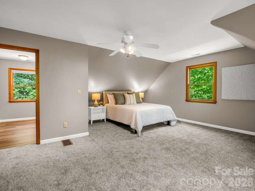 2304 Mountain Page Road, Saluda, NC 28773.  MLS# CAR4366725, YatesRealty ID 22195. Upper Level Primary Suite