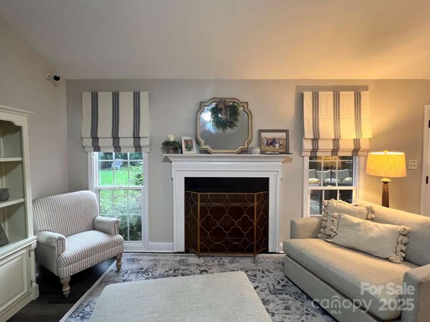 1344 Moonshadow Lane, Shelby, NC 28150.  MLS# CAR4274904, YatesRealty ID 22196. Living Room Fireplace with Working Gas Logs and Custom Window Treatments