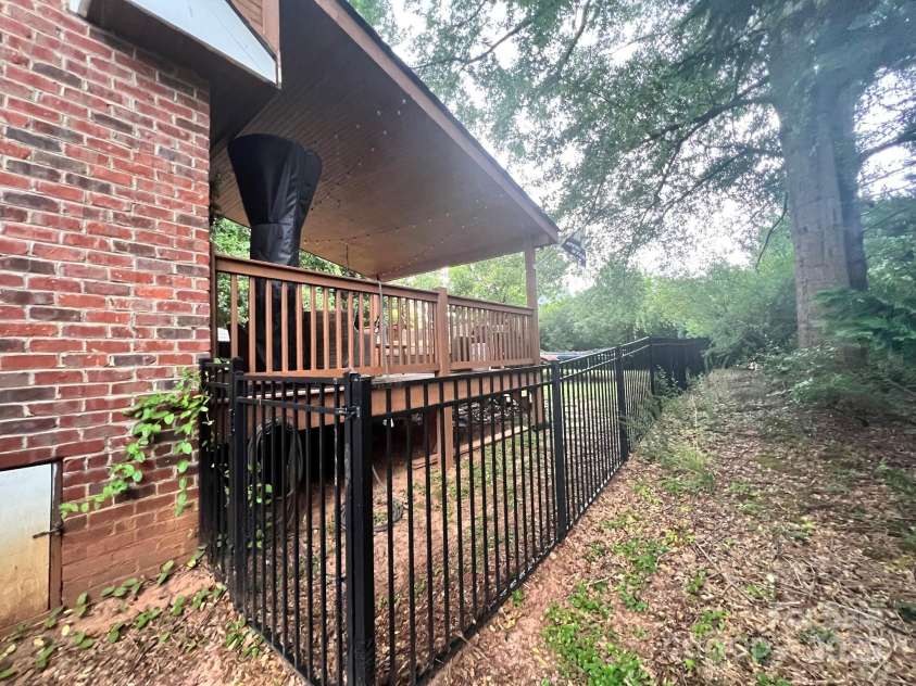 1344 Moonshadow Lane, Shelby, NC 28150.  MLS# CAR4274904, YatesRealty ID 22196. Wrought Iron Fenced in Backyard
