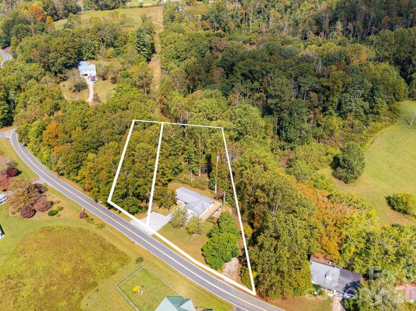 1007 Dula Road, Spruce Pine, NC 28777.  MLS# CAR4307434, YatesRealty ID 22203. 2 parcels 