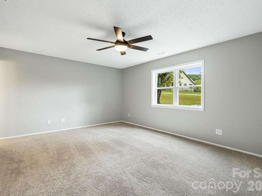 1007 Dula Road, Spruce Pine, NC 28777.  MLS# CAR4307434, YatesRealty ID 22203. Primary bedroom suite