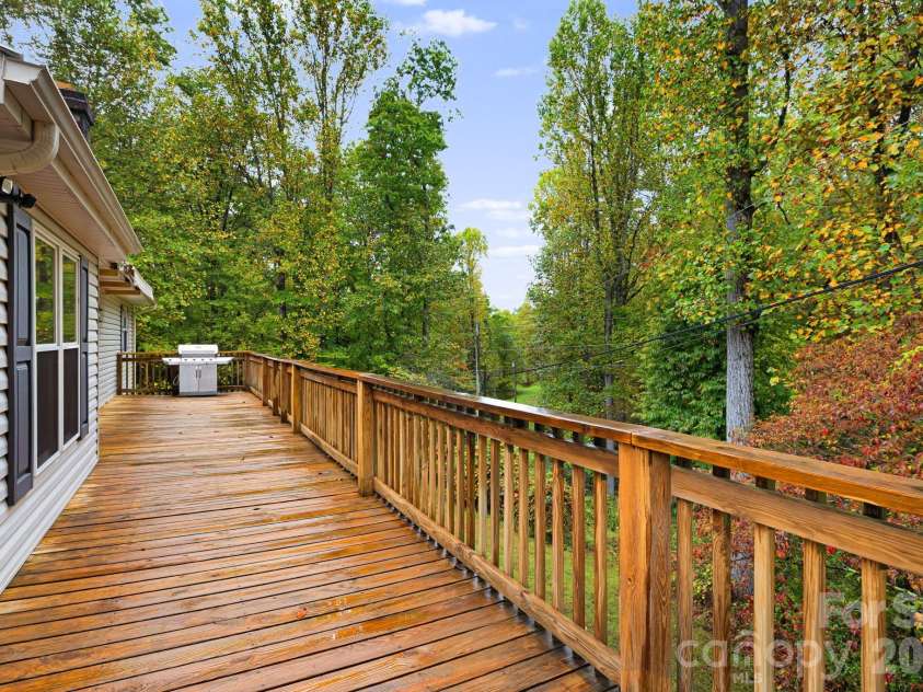 1007 Dula Road, Spruce Pine, NC 28777.  MLS# CAR4307434, YatesRealty ID 22203. Side deck