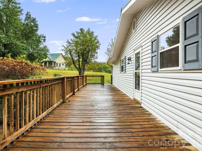 1007 Dula Road, Spruce Pine, NC 28777.  MLS# CAR4307434, YatesRealty ID 22203. Side deck