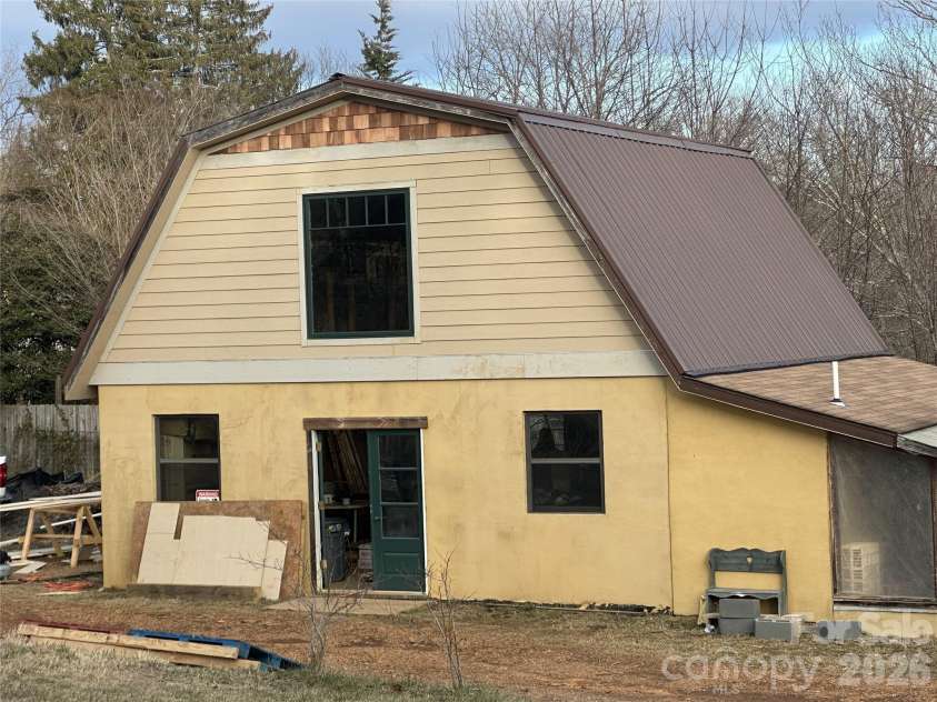 23 Fireside Drive, Asheville, NC 28806.  MLS# CAR4318577, YatesRealty ID 22204. Restored barn will be community house