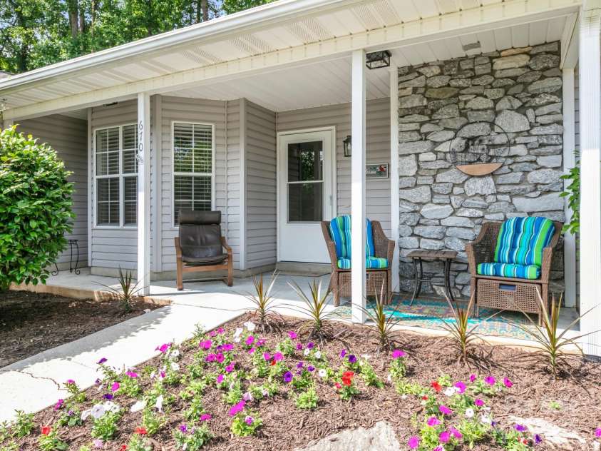 670 New Village Drive, Hendersonville, NC 28791.  MLS# CAR4272117, YatesRealty ID 22206. Covered front porch