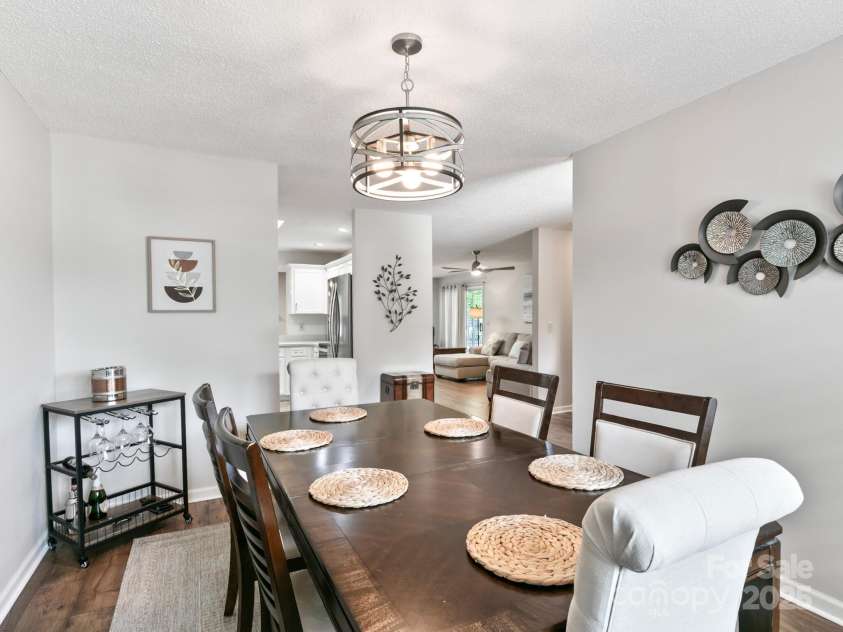 670 New Village Drive, Hendersonville, NC 28791.  MLS# CAR4272117, YatesRealty ID 22206. Dining view into kitchen/living