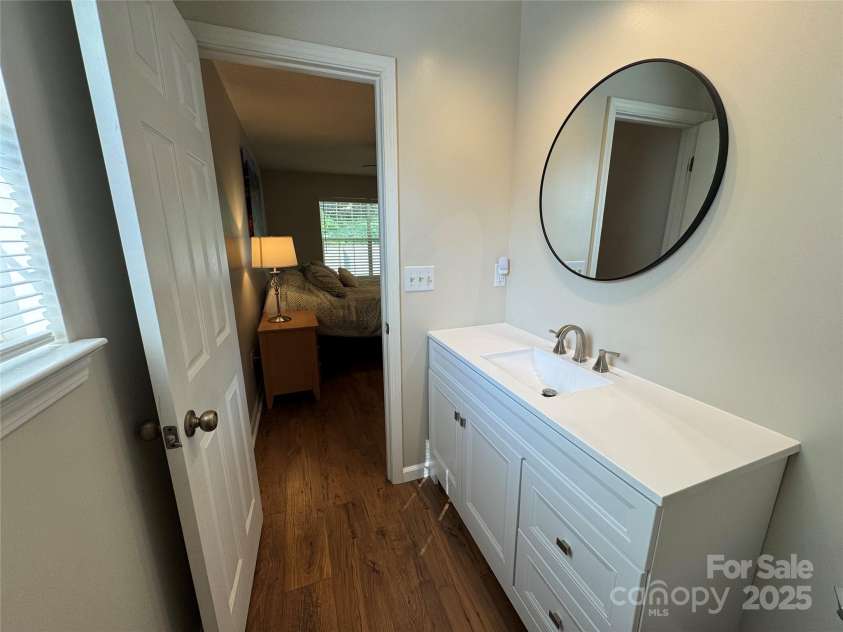 670 New Village Drive, Hendersonville, NC 28791.  MLS# CAR4272117, YatesRealty ID 22206. Primary bath