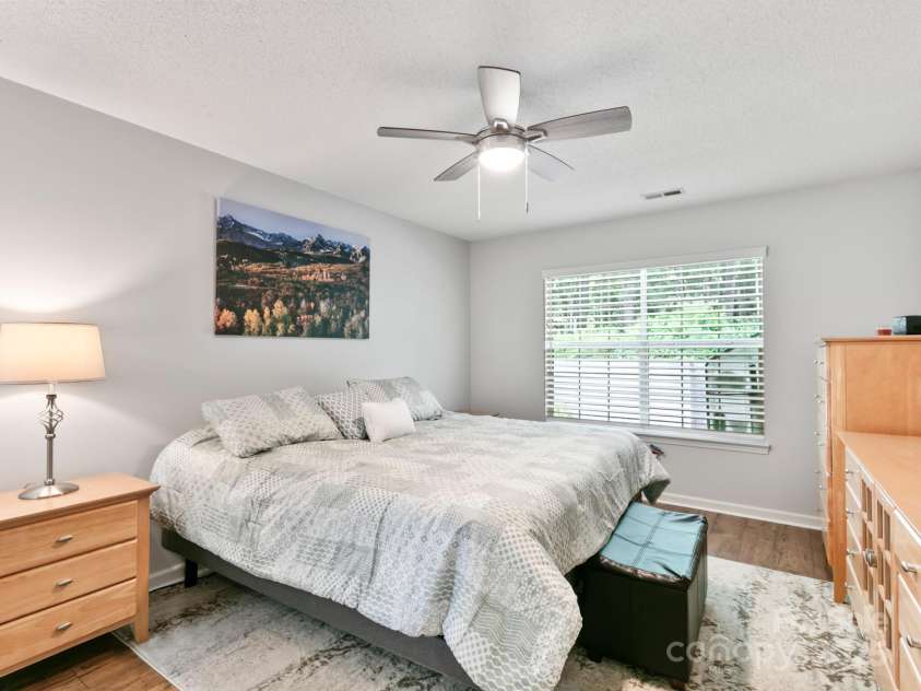 670 New Village Drive, Hendersonville, NC 28791.  MLS# CAR4272117, YatesRealty ID 22206. Primary bedroom