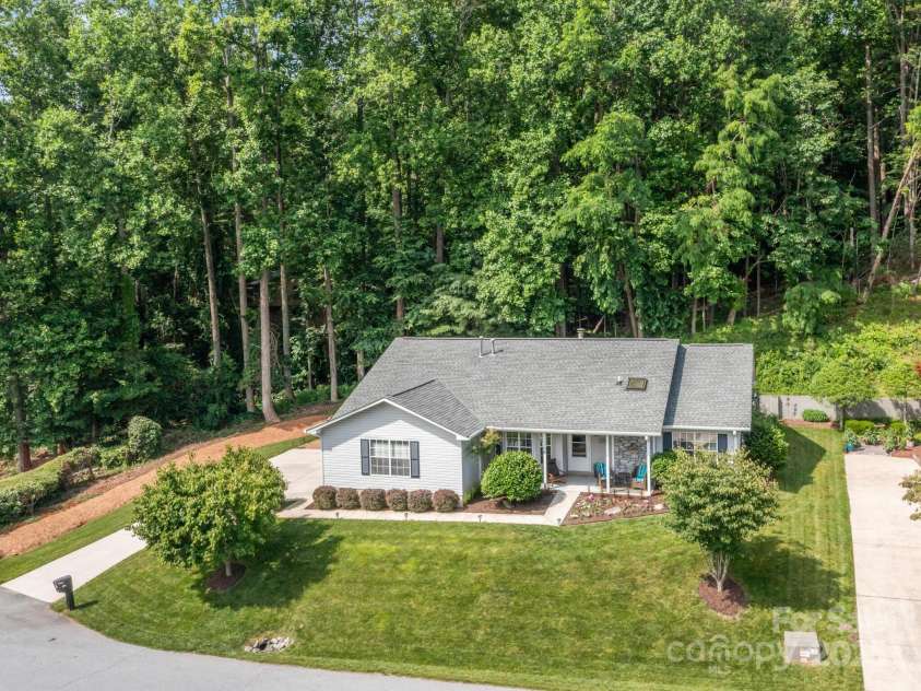 670 New Village Drive, Hendersonville, NC 28791.  MLS# CAR4272117, YatesRealty ID 22206. Privacy abounds